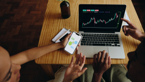 Business professionals analyzing financial data, representing private commercial lending and alternative lending strategies.