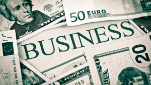 Business newspaper surrounded by international currency notes, symbolizing alternative financing options for overlooked businesses and entrepreneurs.