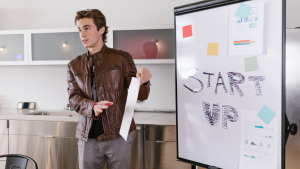 Startup team reviewing private lending benefits for 2025 growth.