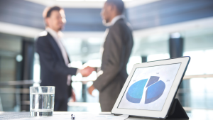 Two business professionals shaking hands after securing Alternative financing for them small business.